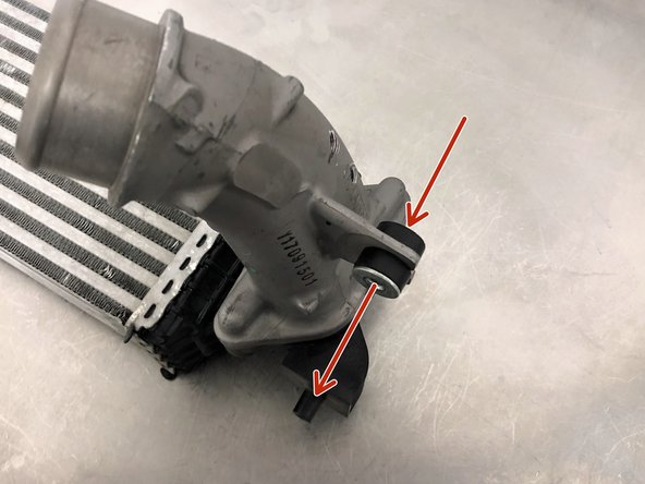 Remove the metal sleeve from the rubber grommet on the OEM hot pipe