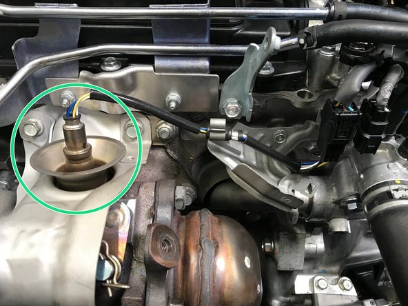 Press a tab on the back of the wiring connection and pull down off the bracket as shown in second image