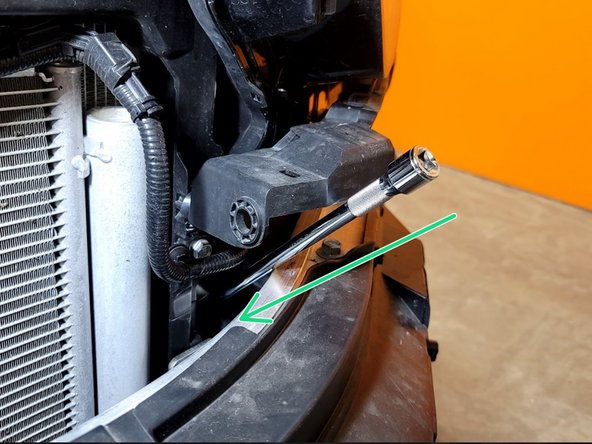 Bumper is not reinstalled at this point. Image shows bumper so you can see how small a slot you are going for here