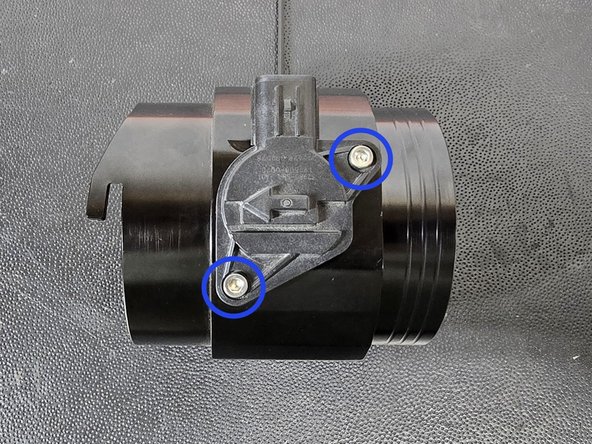Remove the 3mm provided cap screws from the 27Won MAF housing using the provided T-handle hex wrench