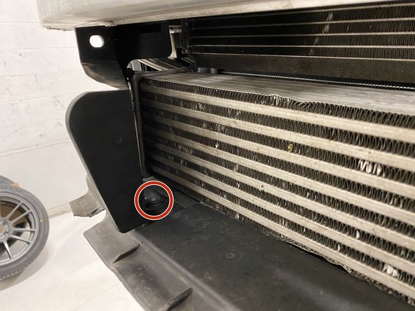 Use a flathead screwdriver to remove the two (2) push clips