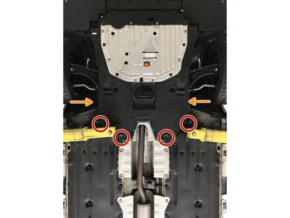 Locate the engine under tray to gain access to the connection between the front-pipe and down stream exhaust