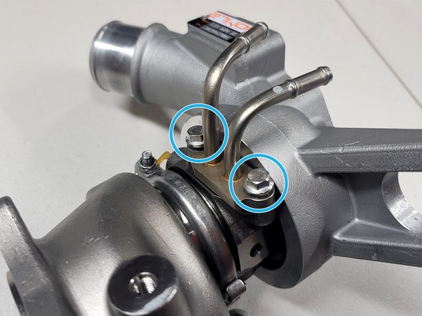 OE gasket should come off with hardlines. This is reused