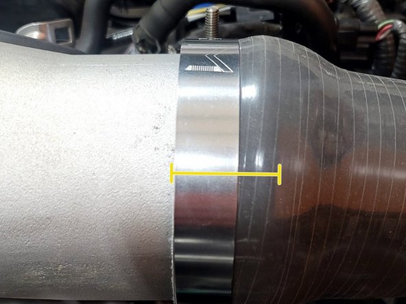 Remove three (3) plastic clips securing PRL inlet