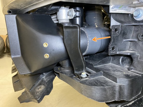 Slide the coupler over the intercooler outlet until it stops