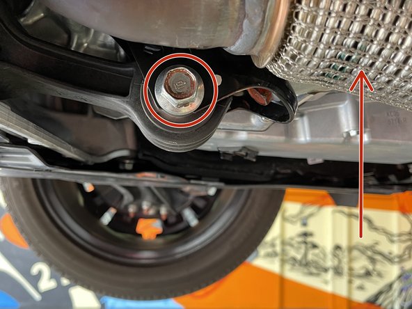 Locate the front and rear bolts for OE rear motor mount
