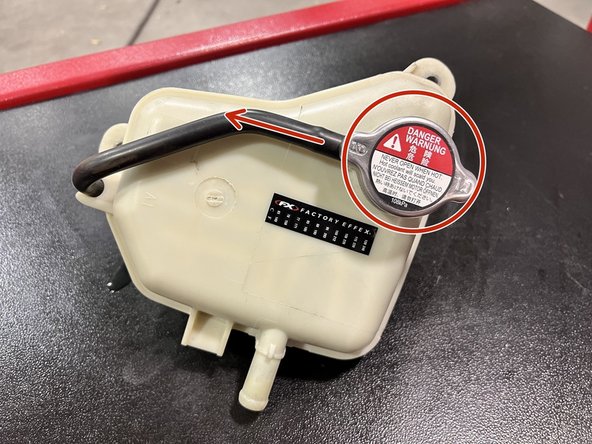 Drain whatever coolant remains in OE tank into 27WON tank