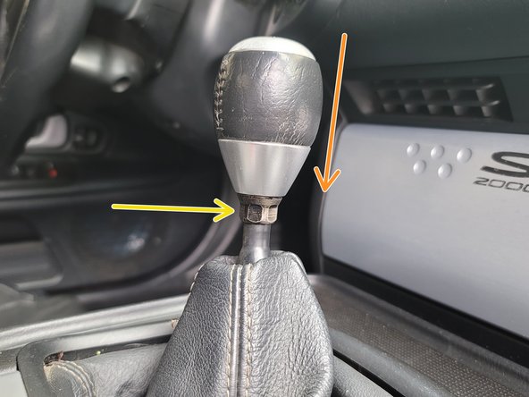 Thread the shift knob back in the shifter