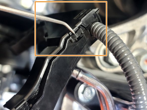 Use small pick to unclip six (6) clips as shown