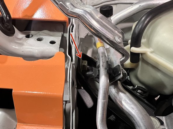 Remove from the vehicle and set aside for reinstallation later