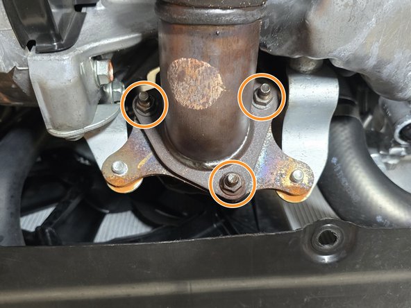 If you have the 27WON Down Pipe installed, use a 15mm socket to remove the (3) nuts holding the front pipe to the down pipe