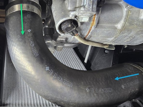 Slide this clamp toward the center of the OEM boost tube and out of the way