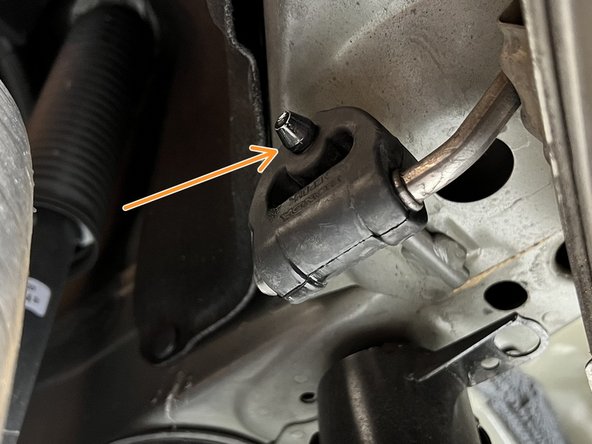 Using a spray cleaner, lubricate the hanger support