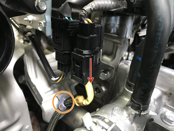 Disconnect the O2 sensor wire as shown with red arrow