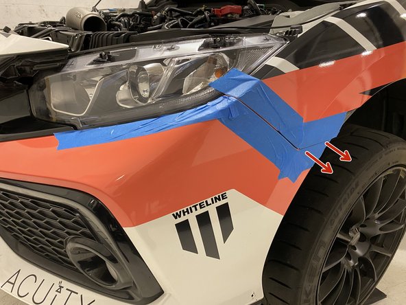 Starting at the corner of the bumper, pull outward until the corner pops free from the fender