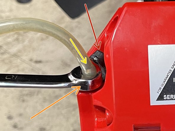 Remove the cap from the bleed screw as shown