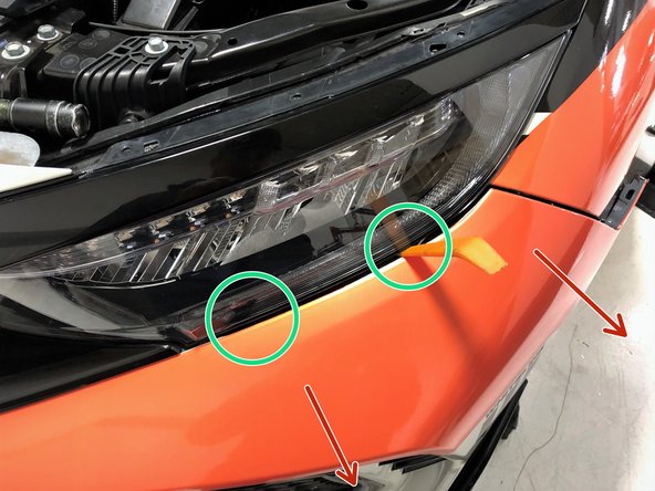 Moving along the headlight, keep pulling outward slightly