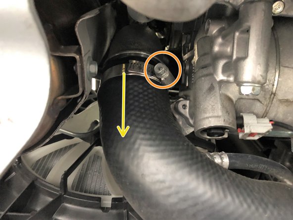 Slide the clamp toward the center of the OEM hot side boost tube and out of the way