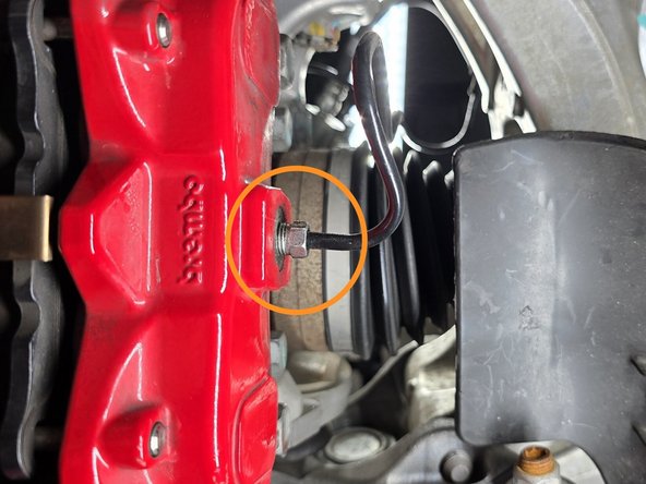 It is critical to use a Line Wrench (one is shown in Step 20) to loosen the brake line connection.  Using the open end of a standard wrench may round over the corners