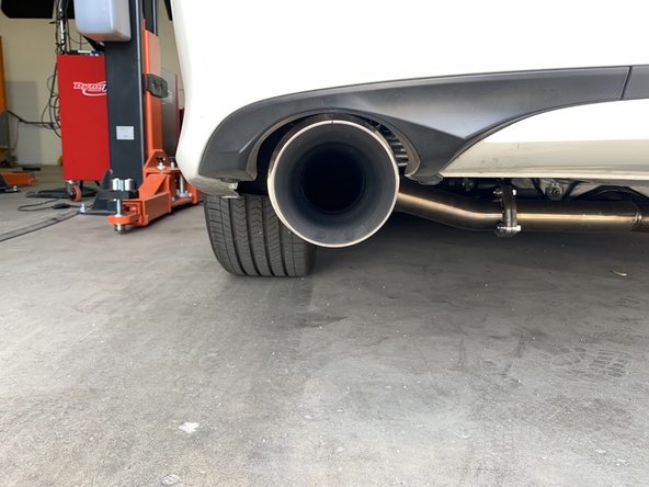 If the tips are sitting high, there may be a rubber hanger that is upside-down. Verify that all hangers are oriented correctly