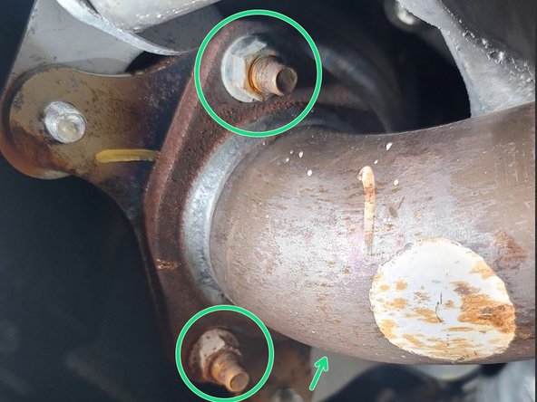 Reinstall three (3) nuts securing front pipe to exhaust using 14mm socket and ratchet