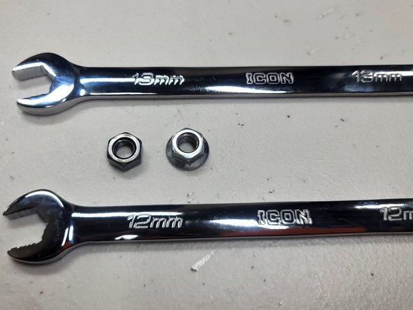 Gather provided 13mm nut, a 12mm and 13mm wrench along with OE TIP flange nut