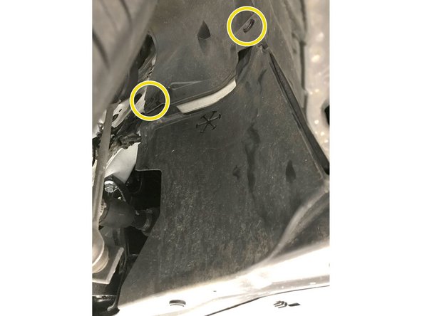 Passenger side shown, please repeat for the driver side before removing the under tray