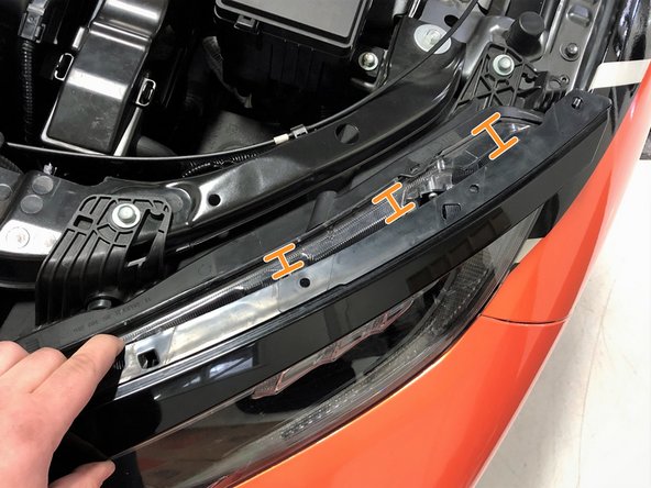 These tabs do not require very much pressure and can break if too much pressure is used. Pull outward slighly on the trim and you will feel the &quot;pop&quot; as each clip releases