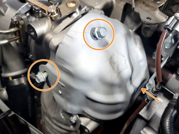 Reinstall the OEM upper heat shield using the three OEM bolts. Torque to 18 ft-lbs.