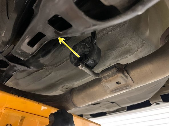 Use tongue &amp; groove pliers to press the rod out of the rubber hanger then remove the hangers off the exhaust from the rubber supports as shown