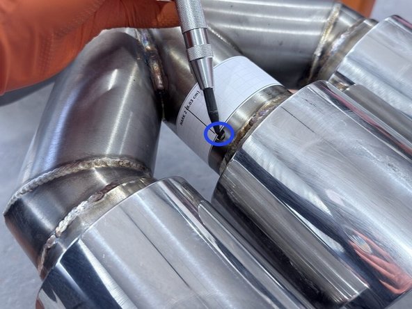 Mark the location of the final two holes and drill