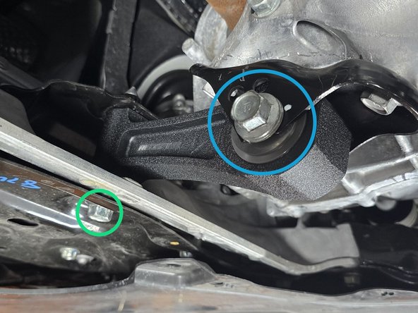 Use a 17mm socket and torque wrench to torque rear bolt to 65lb-ft