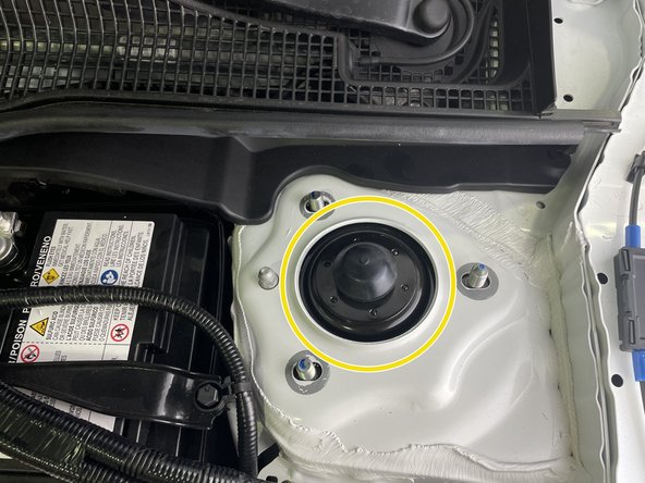 Remove three (3) flange nuts with a 14mm deep socket and ratchet wrench from the driver side