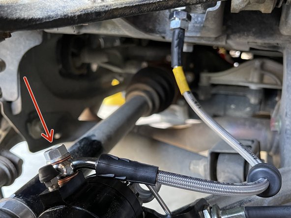 Route the hose as shown