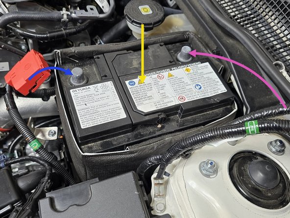 Place the battery into the plastic tray in the orientation shown