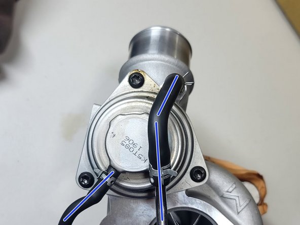 Use 13mm wrench on inner provided nut to remove stud from compressor cover