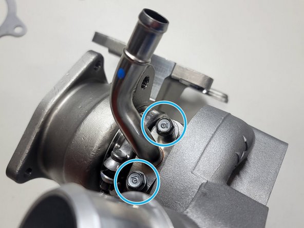 Install oil return using OE hardware on GIN turbocharger. Torque to 9-11 ft-lbs