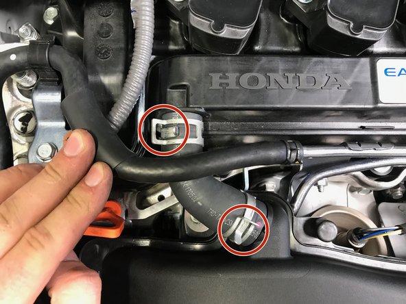 Use pliers to loosen the spring clamps.  Slide the clamps towards the center of the hose