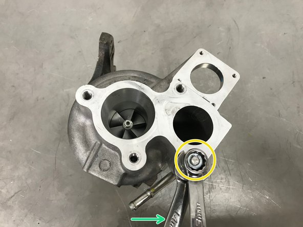 Thread on the OE flange nut onto the turbo stud on top of the M8 nut