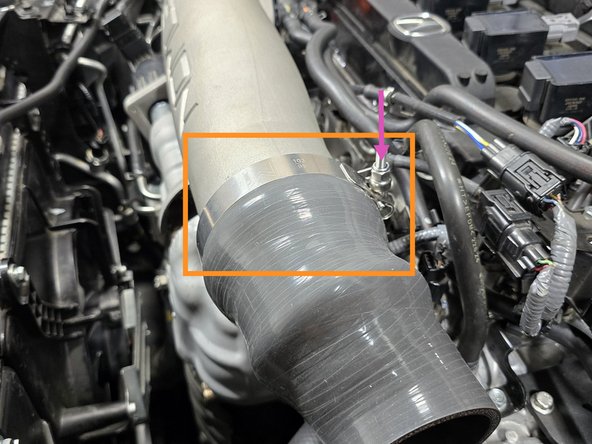 Using the provided 95-103mm T-bolt clamp for 27WON TIP or 70-78mm T-bolt clamp for OE TIP secure the silicone to the TIP without changing it's orientation from the step before