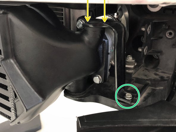 Install the OEM cold side bracket onto the 27WON intercooler. The rubber grommet fits over the peg on the endtank