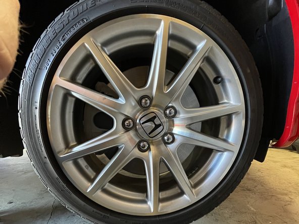 Raise the vehicle and support with jackstands in the OE recommended locations and remove the front wheels/tires