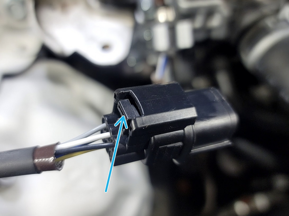 Use Pliers to pinch loom clamp to free wires