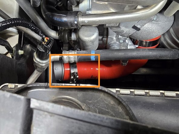 If you tightened this clamp while under the car, you can skip this step