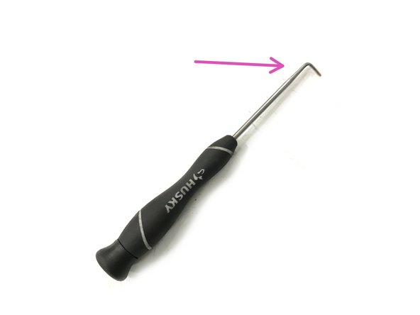 While loosening the bolt, push on the bridge spacer towards the rotor then remove the bolt