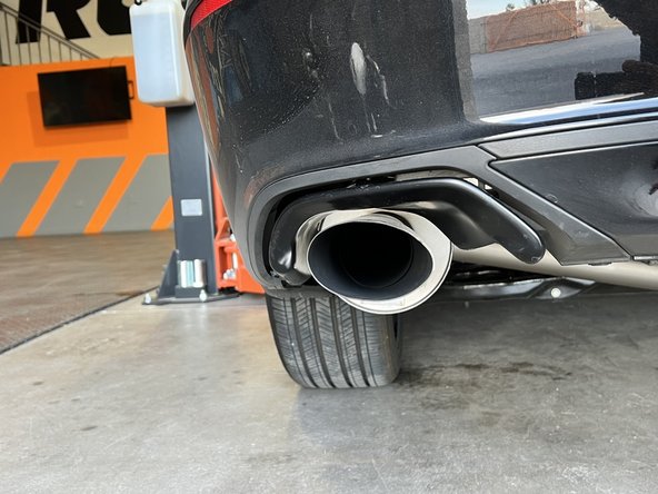 If the tips are sitting high, there may be a rubber hanger that is upside-down. Verify that all hangers are oriented correctly