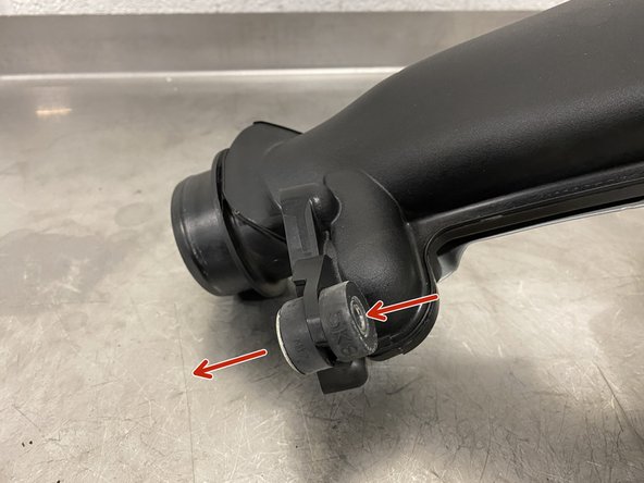 Locate the shown rubber mounting isolator on the OEM TIP