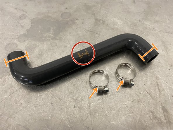 Locate the 27WON valve cover breather hose - the &quot;W&quot; should be facing the front of the vehicle when installed