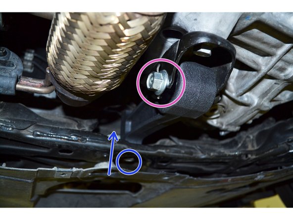 Using the 17mm socket and torque wrench, torque bolt to 65 ft-lbs