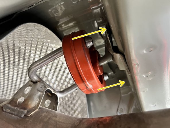 Use tongue &amp; groove pliers to press the two outer rods out of the rubber hanger. Leave the hanger on the car for install of the 27WON system later